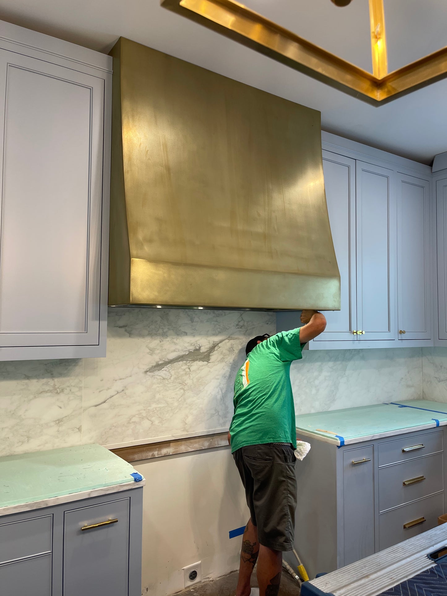 Sloped Range Hood - with trim and strapping - Bronze / Gold