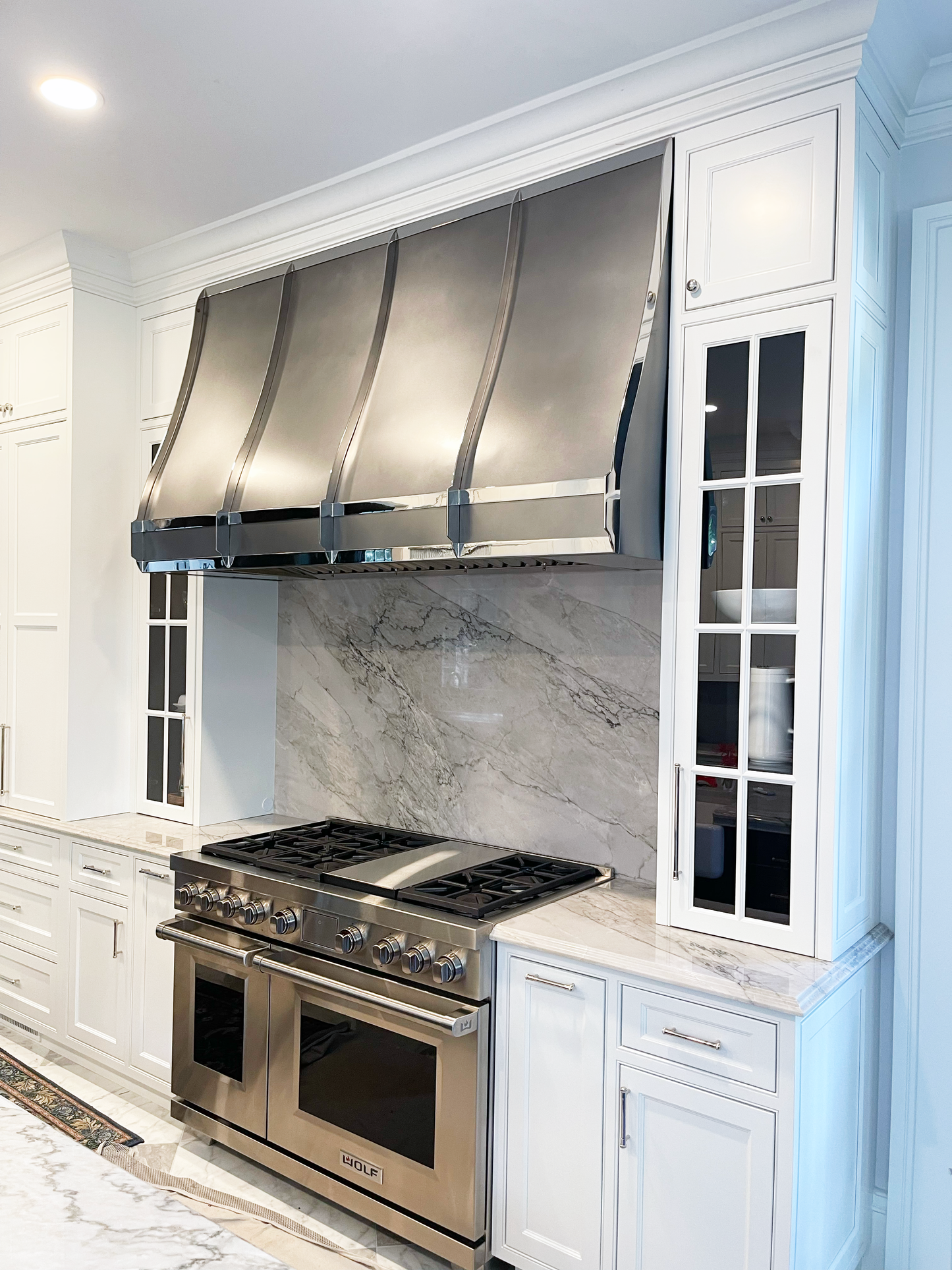 Sloped Range Hood - with trim and strapping - Stainless