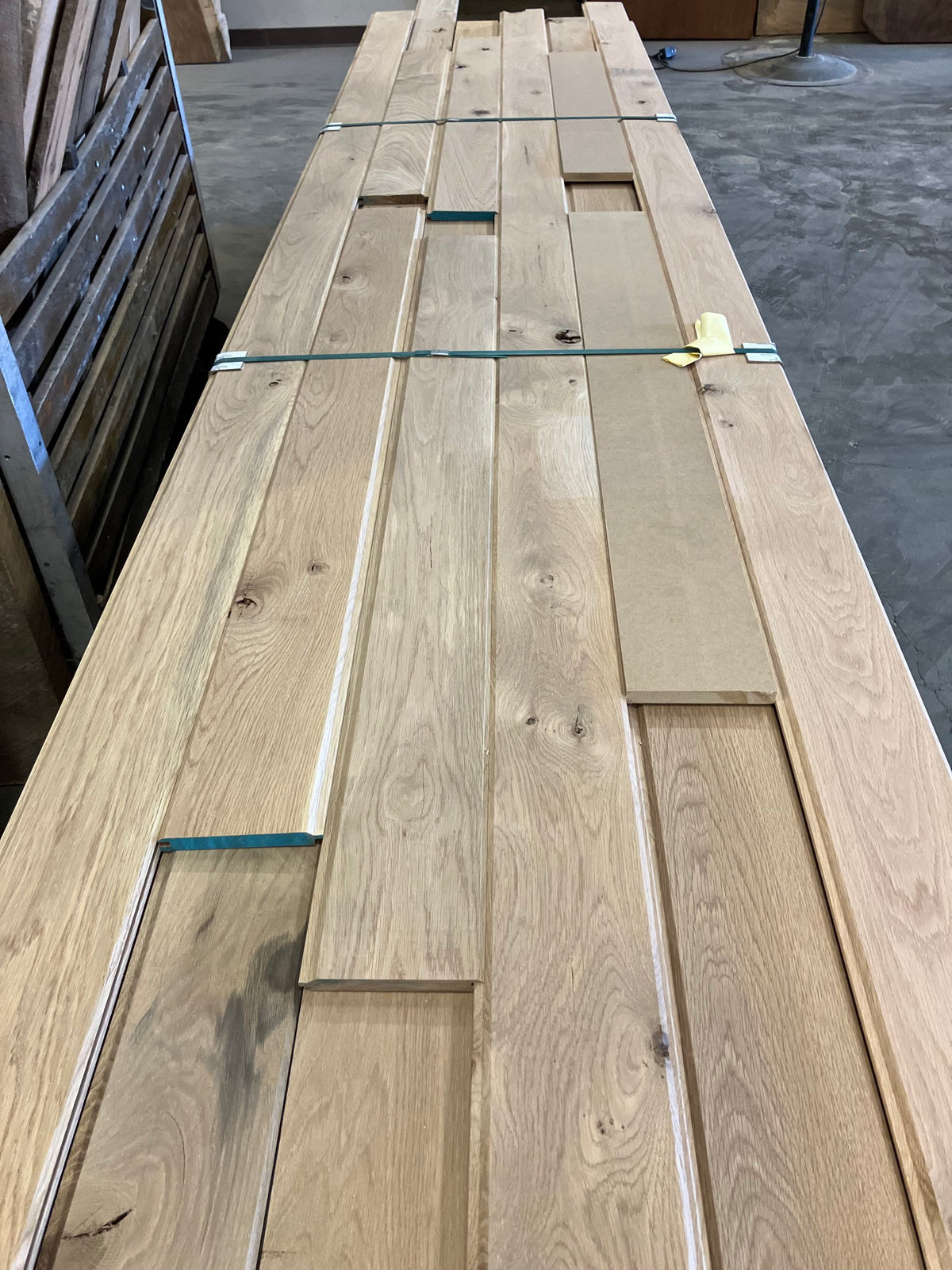 Solid white oak character grade ceiling boards stacked at the yard - Charlotte Lumber