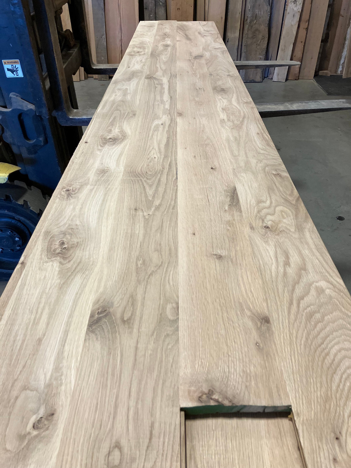 Close-up of character grade white oak boards showing knots and grain - Charlotte Lumber